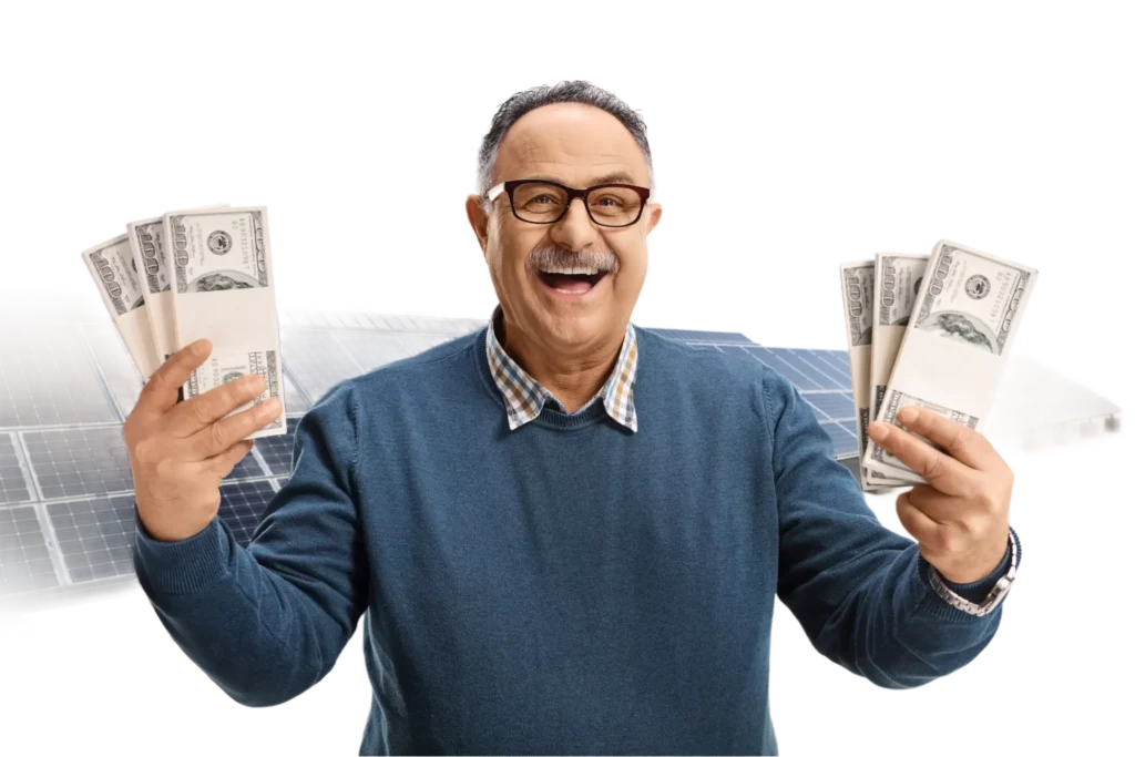 Man Holding Money in Front of Solar Panel